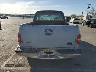 2000 Ford F-150 XL with VIN 1FTZX0723YKA02769, listed as a Copart auction lot 78722714 with 354,312 mi miles and Salvage title. Bid and sale history available at DreamBid. Image 6.