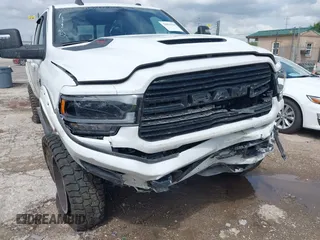 2023 Ram 2500 Laramie with VIN 3C6UR5FL3PG553812, listed as a IAAI auction lot 39891964 with 33,303 mi miles. Bid and sale history available at carsss.com. Image 6.