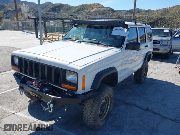 1997 Jeep Cherokee SE with VIN 1J4FJ28S7VL553270, listed as a IAAI auction lot 41825524 with 157,015 mi miles. Bid and sale history available at carsss.com. Image 18.