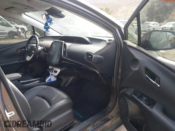 2018 Toyota Prius Plus with VIN JTDKARFPXJ3104302, listed as a IAAI auction lot 42127312 with 87,531 mi miles and . Bid and sale history available at DreamBid. Image 5.
