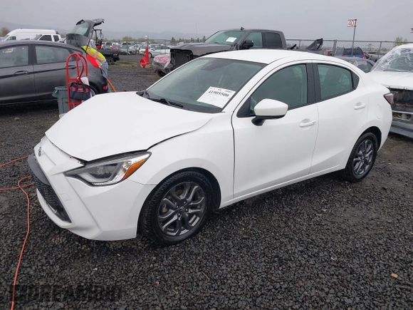 2019 Toyota Yaris L z VIN 3MYDLBYV5KY506616, wystawiony jako IAAI lot #41905500 z przebiegiem 62 758 mil mil oraz . Historia ofert i sprzedaży dostępna na DreamBid. Obrazek 2.