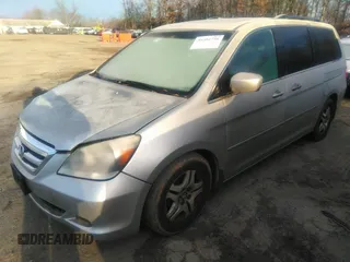 2006 Honda Odyssey EX-L with VIN 5FNRL38616B413712, listed as a IAAI auction lot 39878116 with 228,623 mi miles. Bid and sale history available at carsss.com. Image 2.