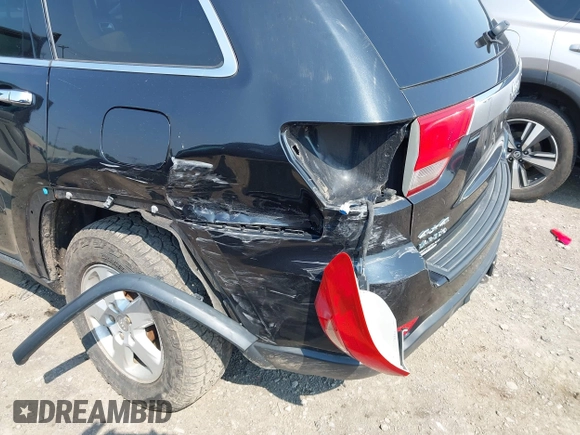 2011 Jeep Grand Cherokee Laredo with VIN 1J4RR4GG1BC534787, listed as a IAAI auction lot 42486840 with 186,229 mi miles and . Bid and sale history available at DreamBid. Image 6.