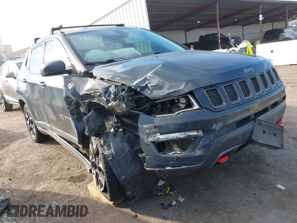 2017 Jeep Compass Trailhawk with VIN 3C4NJDDBXHT657425, listed as a IAAI auction lot 41022289 with 83,003 mi miles and . Bid and sale history available at DreamBid. Image 1.
