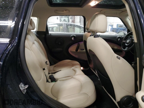 2013 MINI Countryman S ALL4 with VIN WMWZC5C5XDWM16477, listed as a Copart auction lot 51666385 with 112,383 mi miles and Salvage title. Bid and sale history available at DreamBid. Image 11.