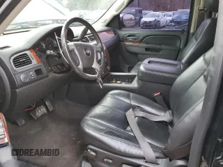 2014 Chevrolet Suburban LT with VIN 1GNSCJE01ER222961, listed as a Copart auction lot 84841744 with 168,131 mi miles and Salvage title. Bid and sale history available at DreamBid. Image 7.