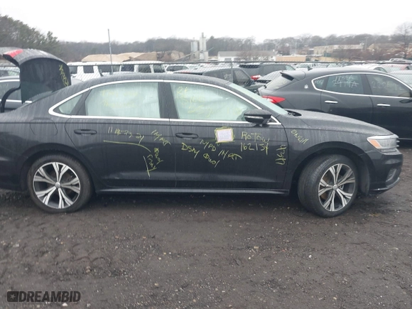 2021 Volkswagen Passat 2.0T SE with VIN 1VWSA7A39MC011751, listed as a IAAI auction lot 41485032 with 999,999 mi miles. Bid and sale history available at carsss.com. Image 12.