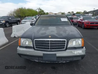 1992 Mercedes-Benz 500 z VIN WDBGA51E0NA023491, wystawiony jako IAAI lot #42058835 z przebiegiem 260 421 mil mil oraz . Historia ofert i sprzedaży dostępna na DreamBid. Obrazek 6.