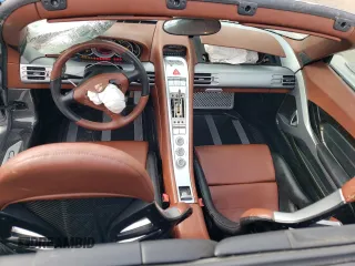 2004 Porsche Carrera GT z VIN WP0CA29894L001019, wystawiony jako Copart lot #52988584 z przebiegiem 4486 mil mil oraz Szkody całkowita. Historia ofert i sprzedaży dostępna na DreamBid. Obrazek 8.