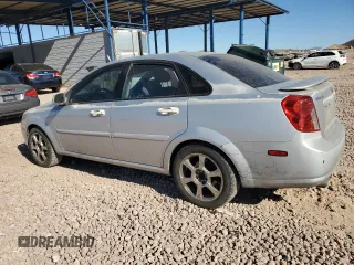 2006 Suzuki Forenza Premium z VIN KL5JJ56Z36K268290, wystawiony jako Copart lot #88509495 z przebiegiem 199 303 mil mil oraz Szkody całkowita. Historia ofert i sprzedaży dostępna na DreamBid. Obrazek 2.