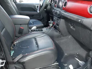 2023 Jeep Wrangler Rubicon with VIN 1C4HJXFGXPW534515, listed as a IAAI auction lot 41524419 with 21,376 mi miles and . Bid and sale history available at DreamBid. Image 5.