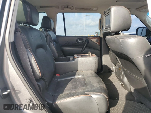 2017 Nissan Armada Platinum z VIN JN8AY2NE2H9700319, wystawiony jako Copart lot #51859735 z przebiegiem Nie podano mil oraz Szkoda całkowita • Salvage title. Historia ofert i sprzedaży dostępna na DreamBid. Obrazek 11.