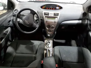 2012 Toyota Yaris with VIN JTDBT4K39C1415296, listed as a Copart auction lot 44793505 with 205,365 mi miles and Salvage Title. Bid and sale history available at DreamBid. Image 8.