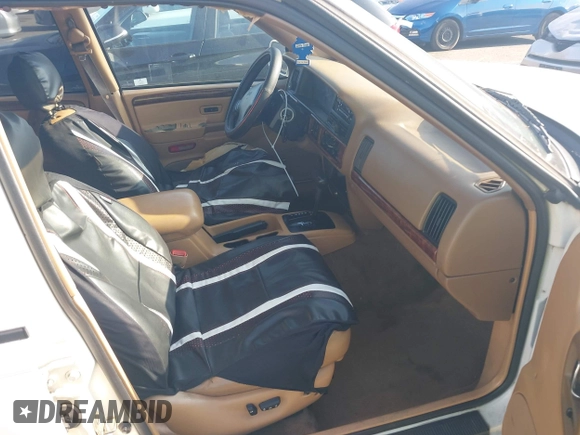 1998 Jeep Grand Cherokee with VIN 1J4FX78S2WC281501, listed as a IAAI auction lot 42140170 with 177,575 mi miles and . Bid and sale history available at DreamBid. Image 5.