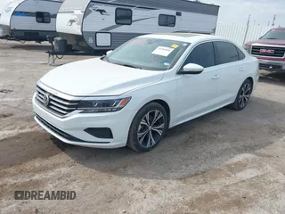 2021 Volkswagen Passat SE z VIN 1VWSA7A30MC016627, wystawiony jako IAAI lot #41904846 z przebiegiem 56 969 mil mil oraz . Historia ofert i sprzedaży dostępna na DreamBid. Obrazek 2.