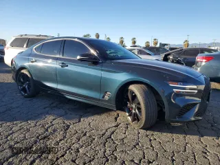 2023 Genesis G70 3.3T with VIN KMTG54TE1PU106881, listed as a Copart auction lot 83988384 with 70,698 mi miles and Salvage Title. Bid and sale history available at DreamBid. Image 4.