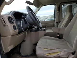 2009 Ford Econoline Passenger XL with VIN 1FBNE31L69DA54219, listed as a Copart auction lot 82971934 with 251,549 mi miles and Salvage title. Bid and sale history available at DreamBid. Image 7.