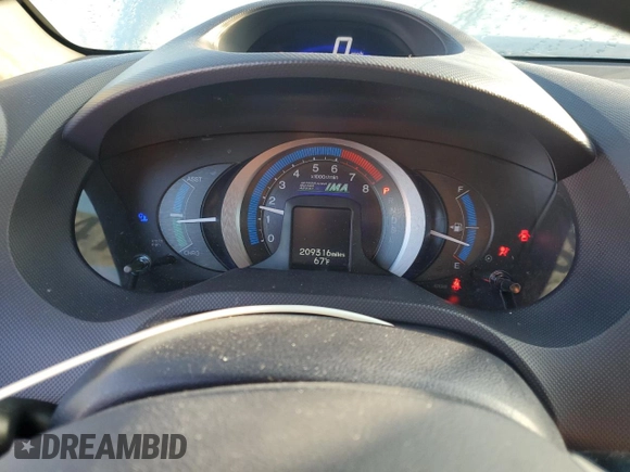 2010 Honda Insight LX with VIN JHMZE2H51AS028849, listed as a Copart auction lot 65547805 with 209,316 mi miles and Salvage title. Bid and sale history available at DreamBid. Image 9.