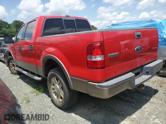 2004 Ford F-150 XLT with VIN 1FTPW14504KD65703, listed as a Copart auction lot 58792215 with 303,083 mi miles and Salvage title. Bid and sale history available at DreamBid. Image 2.