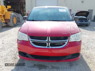 2014 Dodge Grand Caravan American Value with VIN 2C4RDGBG6ER309449, listed as a IAAI auction lot 42148824 with 198,532 mi miles and . Bid and sale history available at DreamBid. Image 6.