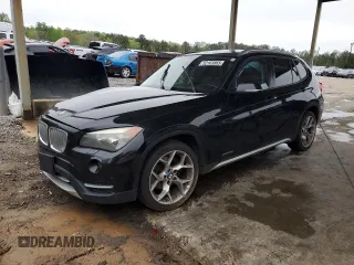 2014 BMW X1 xDrive28i z VIN WBAVL1C56EVY11433, wystawiony jako Copart lot #52163865 z przebiegiem 128 621 mil mil oraz Szkody całkowita. Historia ofert i sprzedaży dostępna na DreamBid. Obrazek 1.