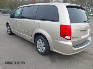 2012 Dodge Grand Caravan SE with VIN 2C4RDGBG4CR298996, listed as a IAAI auction lot 42133423 with 70,354 mi miles and . Bid and sale history available at DreamBid. Image 3.