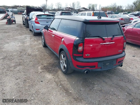 2009 MINI Cooper Clubman S with VIN WMWMM335X9TP74957, listed as a IAAI auction lot 41951315 with 142,387 mi miles. Bid and sale history available at carsss.com. Image 3.