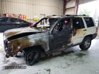 1998 Jeep Grand Cherokee Laredo with VIN 1J4GZ58S2WC222595, listed as a Copart auction lot 51108625 with 0 mi miles and Salvage Title. Bid and sale history available at carsss.com. Image 1.