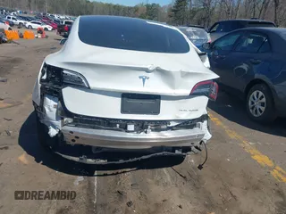 2021 Tesla Model 3 Long Range z VIN 5YJ3E1EB6MF902268, wystawiony jako IAAI lot #41837846 z przebiegiem 37 041 mil mil oraz . Historia ofert i sprzedaży dostępna na DreamBid. Obrazek 6.