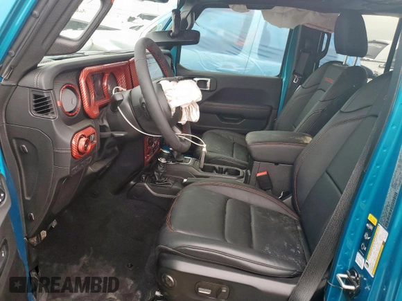 2024 Jeep Wrangler Rubicon X with VIN 1C4RJXFG1RW180410, listed as a Copart auction lot 58039785 with 3,381 mi miles and Salvage title. Bid and sale history available at DreamBid. Image 7.