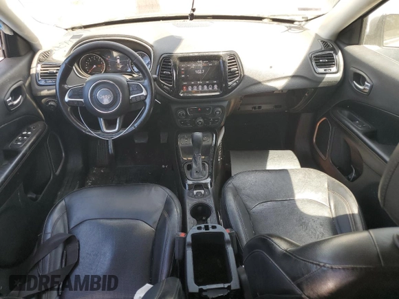 2020 Jeep Compass Limited with VIN 3C4NJCCB3LT128807, listed as a Copart auction lot 56673705 with 94,903 mi miles and Salvage title. Bid and sale history available at DreamBid. Image 8.
