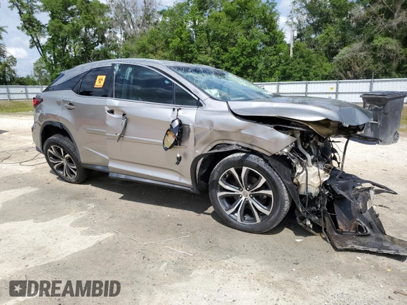 2017 Lexus RX 350 z VIN 2T2ZZMCAXHC075715, wystawiony jako Copart lot #60793845 z przebiegiem 73 633 mil mil oraz Szkoda całkowita • Salvage title. Historia ofert i sprzedaży dostępna na DreamBid. Obrazek 4.