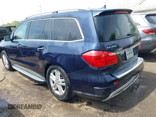 2015 Mercedes-Benz GL-Class GL 450 with VIN 4JGDF6EE8FA542288, listed as a IAAI auction lot 42098527 with 115,312 mi miles. Bid and sale history available at carsss.com. Image 3.