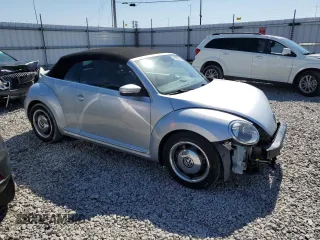2015 Volkswagen Beetle 1.8T with VIN 3VW517AT8FM810709, listed as a Copart auction lot 48065314 with 61,924 mi miles and Salvage Title. Bid and sale history available at DreamBid. Image 4.