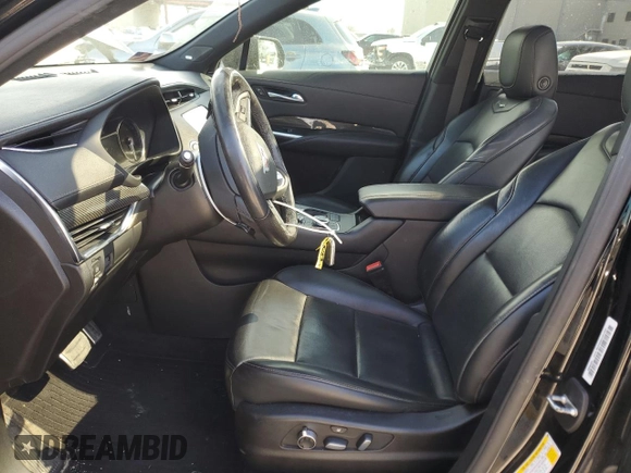 2020 Cadillac XT4 FWD Sport with VIN 1GYFZER49LF024652, listed as a Copart auction lot 46231255 with 87,567 mi miles and Salvage title. Bid and sale history available at DreamBid. Image 7.