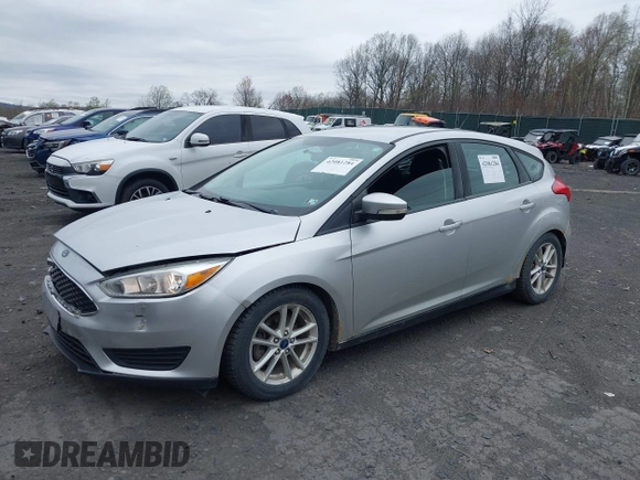 2015 Ford Focus SE with VIN 1FADP3K27FL245114, listed as a IAAI auction lot 42081284 with 90,527 mi miles. Bid and sale history available at carsss.com. Image 2.