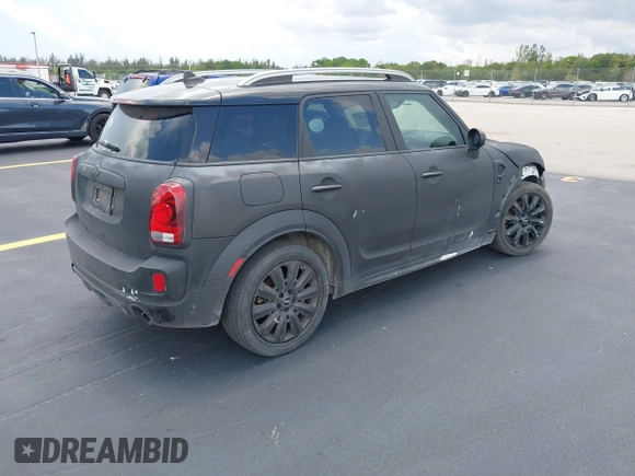2018 MINI Countryman Cooper S z VIN WMZYT3C35J3E00804, wystawiony jako IAAI lot #42194381 z przebiegiem 101 634 mil mil oraz . Historia ofert i sprzedaży dostępna na DreamBid. Obrazek 4.