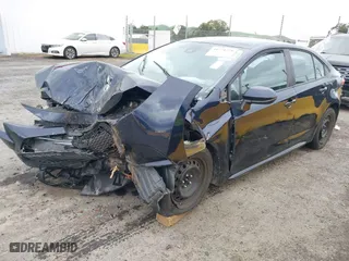 2020 Toyota Corolla LE with VIN 5YFEPRAE4LP126257, listed as a IAAI auction lot 41774270 with 90,768 mi miles. Bid and sale history available at carsss.com. Image 2.