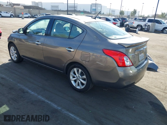 2014 Nissan Versa S with VIN 3N1CN7APXEL817010, listed as a IAAI auction lot 41460129 with 137,040 mi miles. Bid and sale history available at carsss.com. Image 3.