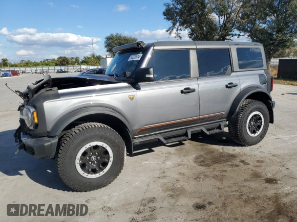 2022 Ford Bronco with VIN 1FMEE5DH1NLB82717, listed as a Copart auction lot 83230614 with 21,593 mi miles and Salvage Title. Bid and sale history available at DreamBid. Image 1.