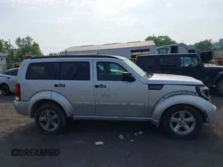 2010 Dodge Nitro SXT z VIN 1D4PU5GK8AW146087, wystawiony jako IAAI lot #42423104 z przebiegiem 220 381 mil mil oraz . Historia ofert i sprzedaży dostępna na DreamBid. Obrazek 13.
