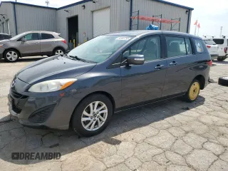 2015 Mazda 5 Sport z VIN JM1CW2BL4F0184530, wystawiony jako Copart lot #56965755 z przebiegiem 144 873 mil mil oraz Szkoda całkowita • Salvage title. Historia ofert i sprzedaży dostępna na DreamBid. Obrazek 1.