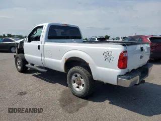 2011 Ford F-250 XL with VIN 1FTBF2B63BEB24712, listed as a Copart auction lot 65013145 with 176,681 mi miles and Salvage title. Bid and sale history available at DreamBid. Image 2.