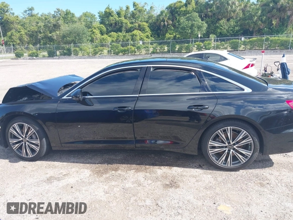 2019 Audi A6 Premium Plus z VIN WAUE8AF24KN121775, wystawiony jako IAAI lot #42235321 z przebiegiem 65 276 mil mil oraz . Historia ofert i sprzedaży dostępna na DreamBid. Obrazek 14.