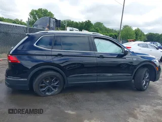 2023 Volkswagen Tiguan SE with VIN 3VV3B7AX4PM136264, listed as a IAAI auction lot 39724241 with 8,774 mi miles and . Bid and sale history available at DreamBid. Image 14.