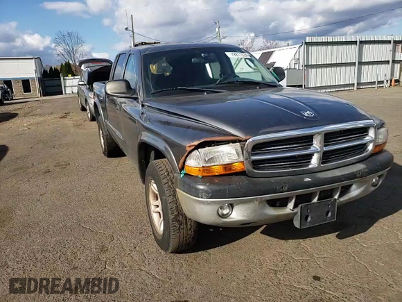 2004 Dodge Dakota Sport z VIN 1D7HG38N64S688604, wystawiony jako Copart lot #79811934 z przebiegiem 160 377 mil mil oraz Szkoda całkowita • Salvage title. Historia ofert i sprzedaży dostępna na DreamBid. Obrazek 10.