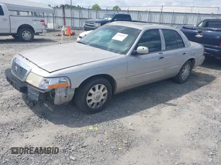 2004 Mercury Grand Marquis LS Premium z VIN 2MHFM75W84X658355, wystawiony jako IAAI lot #42166597 z przebiegiem 214 858 mil mil oraz . Historia ofert i sprzedaży dostępna na DreamBid. Obrazek 2.