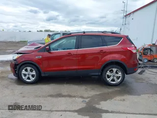 2014 Ford Escape SE z VIN 1FMCU9GX8EUB98766, wystawiony jako IAAI lot #42256143 z przebiegiem 64 074 mil mil oraz . Historia ofert i sprzedaży dostępna na DreamBid. Obrazek 15.