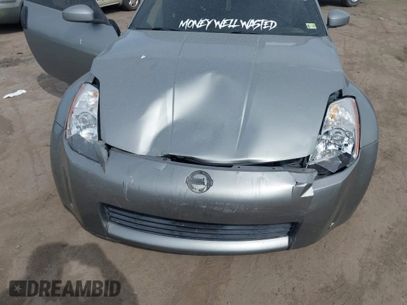 2004 Nissan 350Z Touring with VIN JN1AZ34DX4M100407, listed as a IAAI auction lot 41758380 with 154,166 mi miles. Bid and sale history available at carsss.com. Image 6.