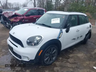 2014 MINI Countryman S with VIN WMWZC3C55EWP52138, listed as a IAAI auction lot 40695292 with 83,083 mi miles and . Bid and sale history available at DreamBid. Image 2.